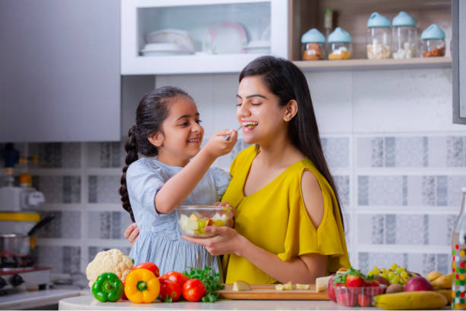 a happy mother in a kitchen