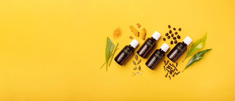 Goeld essential oil family with leaves and vital raw materials