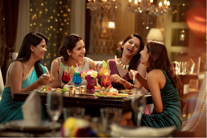 A group of women enjoying a stress-free meal together